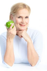 Enjoy Apples Again with a Dental Implant